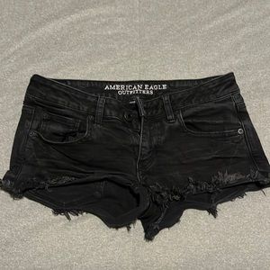 Black ripped American Eagle shorts